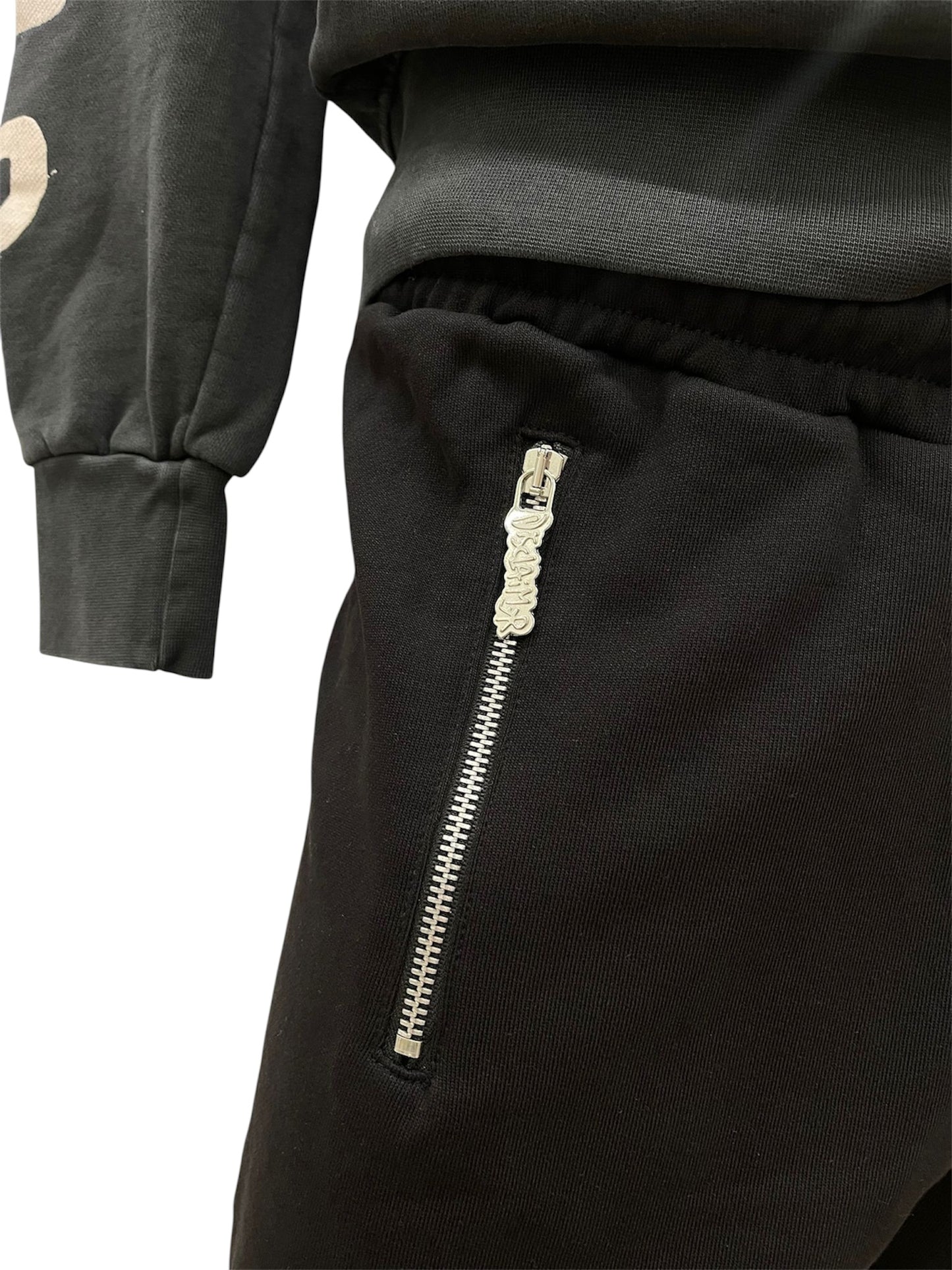 Disclaimer Pantaloni tuta neri con tasche a zip