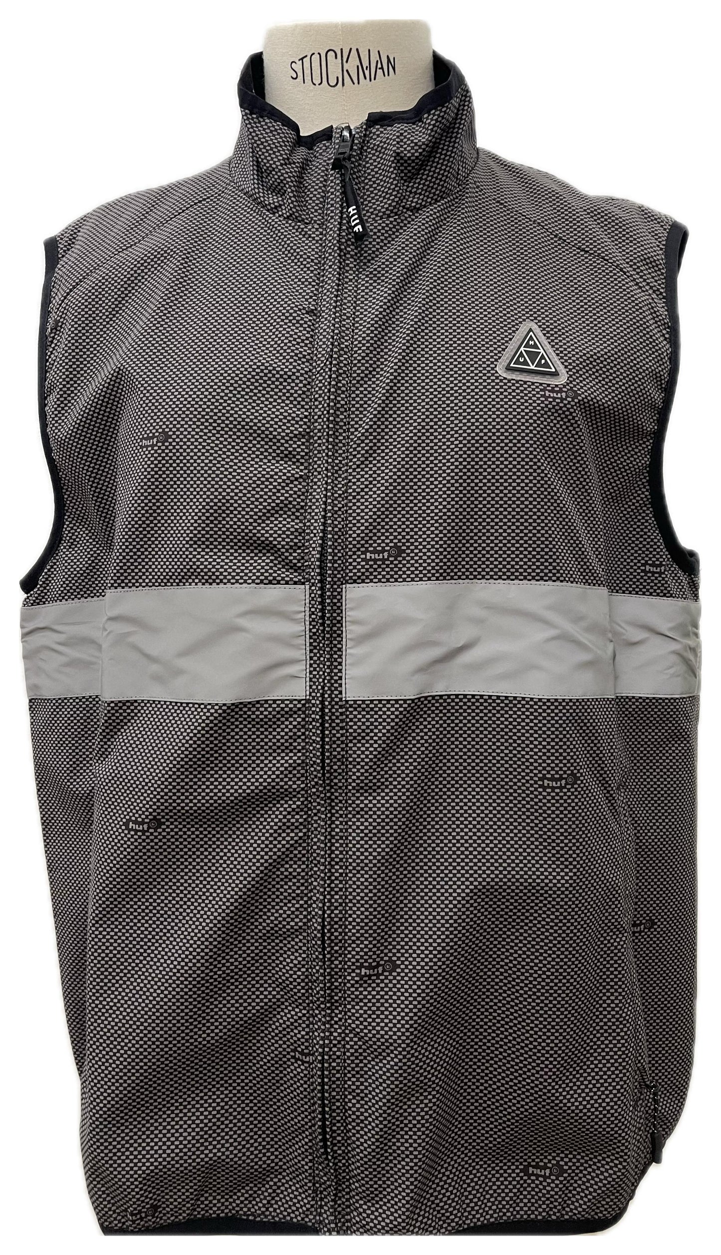 Huf smanicato con tasca sul retro